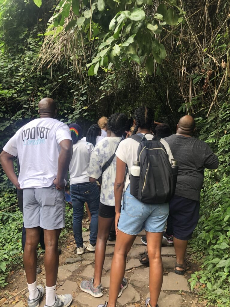 A group of travelers exploring one of the most iconic places to see in Ghana
