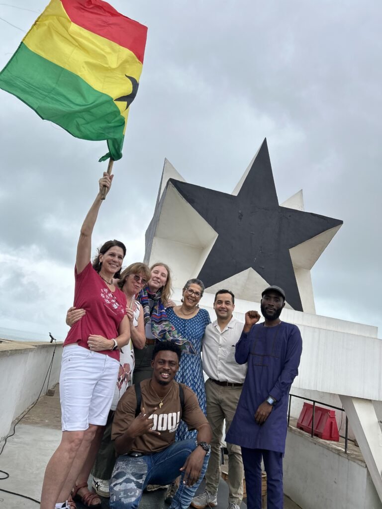 Travelers exploring cultural sites and things to do in accra