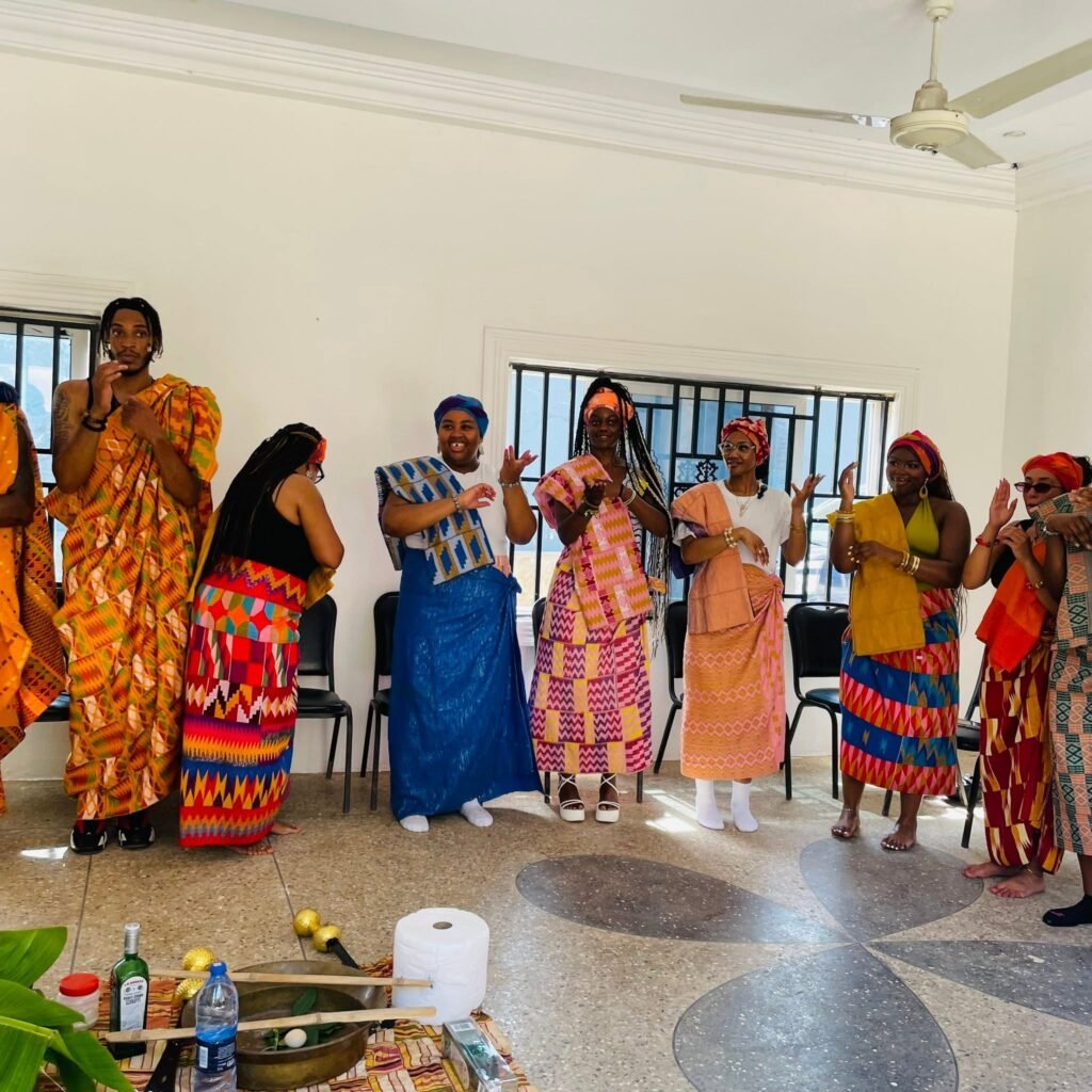 Travelers exploring historic Kumasi tourist sites in the Ashanti region