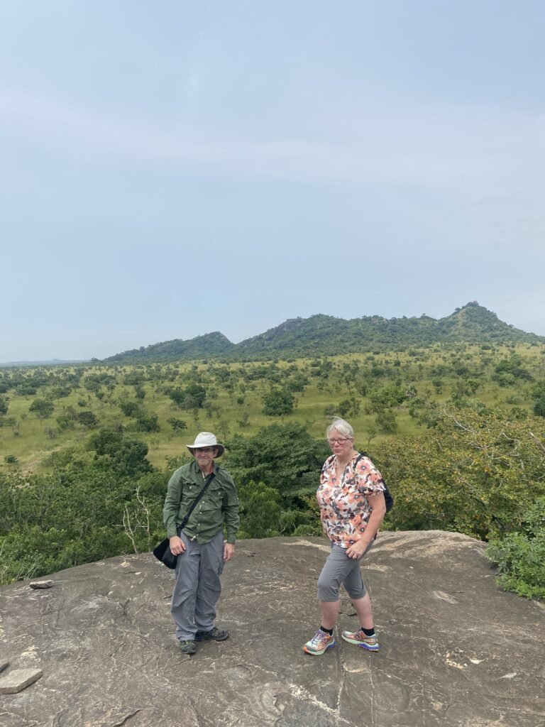 Travelers exploring top things to do in Ghana during a vibrant cultural tour at Shai Hills