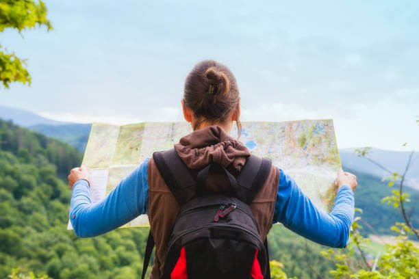 Traveler checking map for the best travels in Ghana